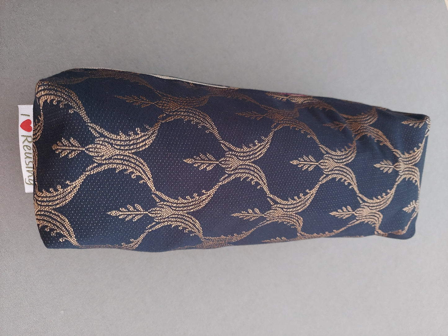 Navy blue and gold pouch
