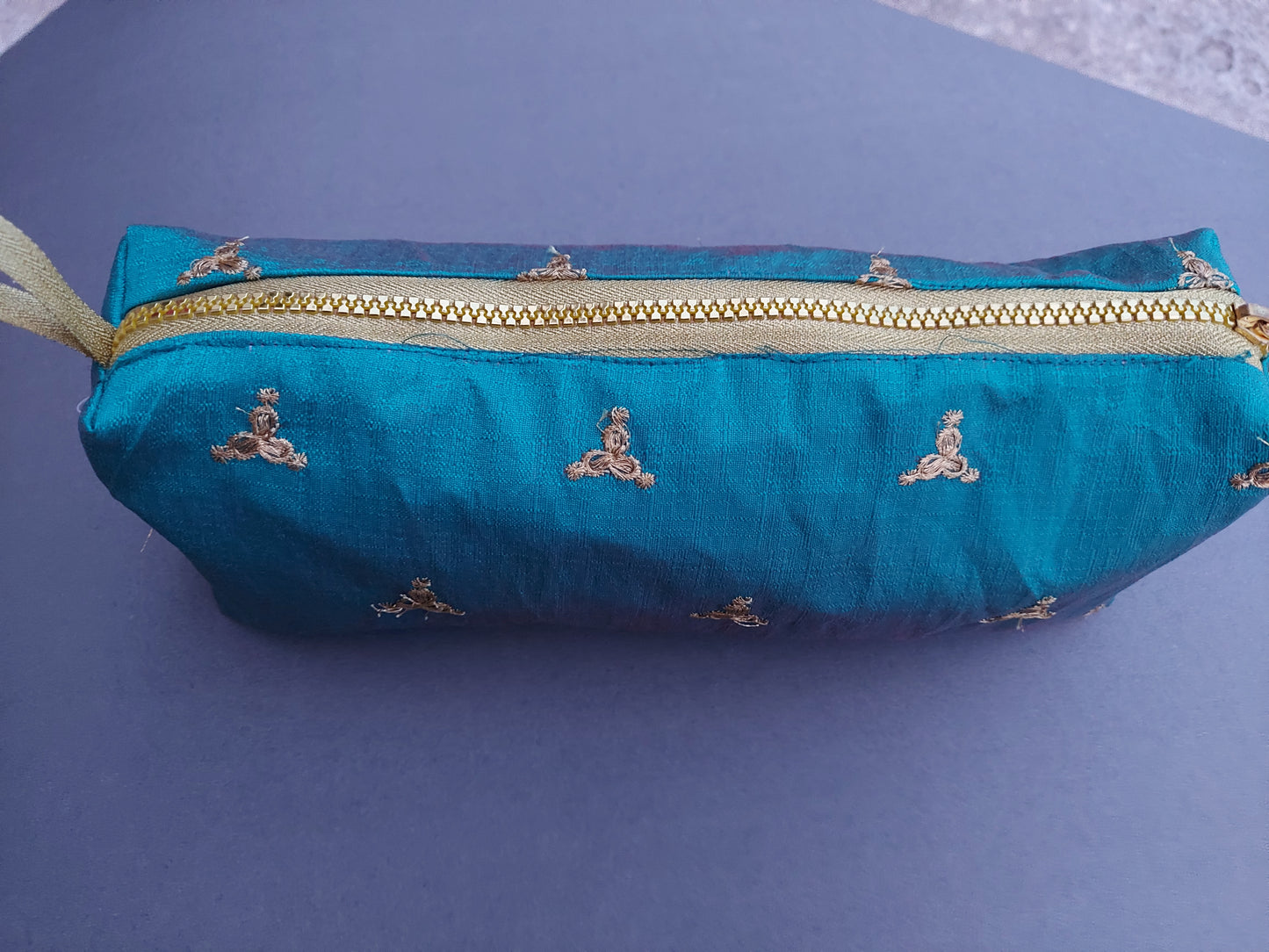 Bright turquoise pouch