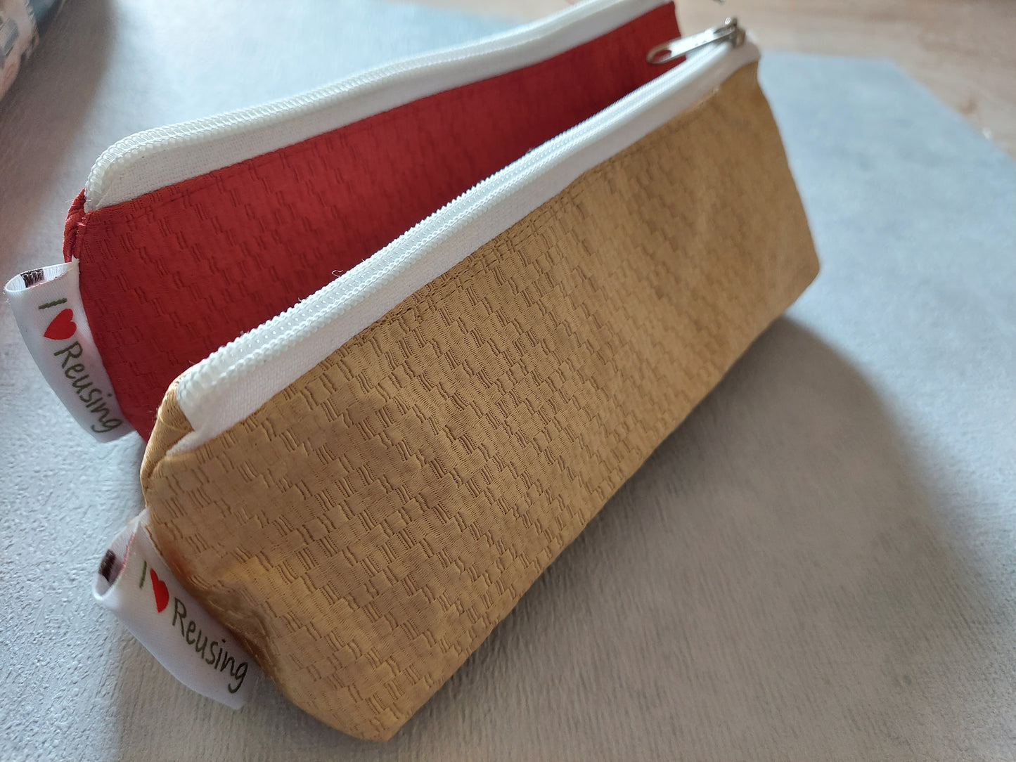 Pair of contrast color triangular pouches