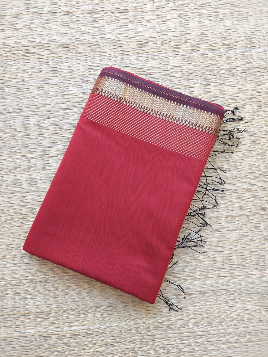 Light red sari with black border