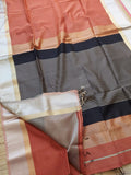 Light brown sari with silver border